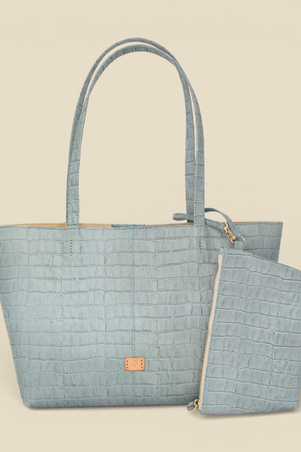 bolso de piel grabada cocodrilo nara neceser azul claro