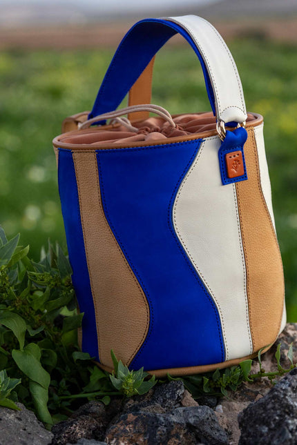 bolso de piel tambour organico indigo foto paisaje fuerteventura flores