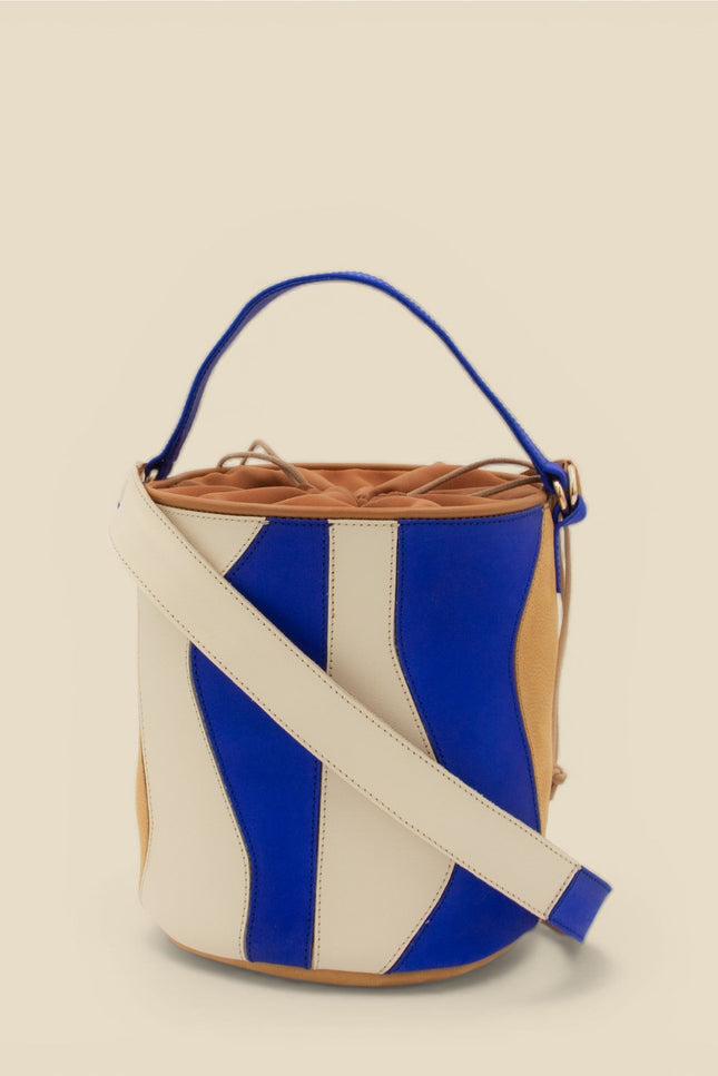 bolso de piel tambour organico indigo foto productotira cruzada