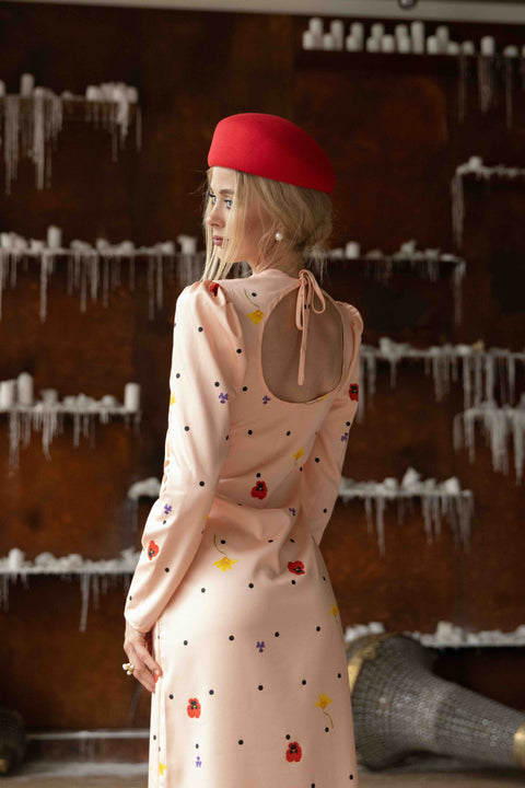 Peach Blossom dress with round cutout and ribbon tie detail, sustainable tencel satin fabric.