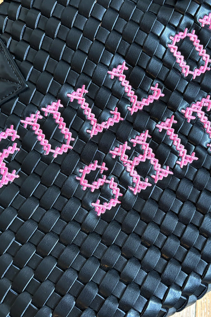 Pink and black vegan woven handbag by Lilly Loves with "FULL OF SHIT" design, featuring a stylish, textured pattern.