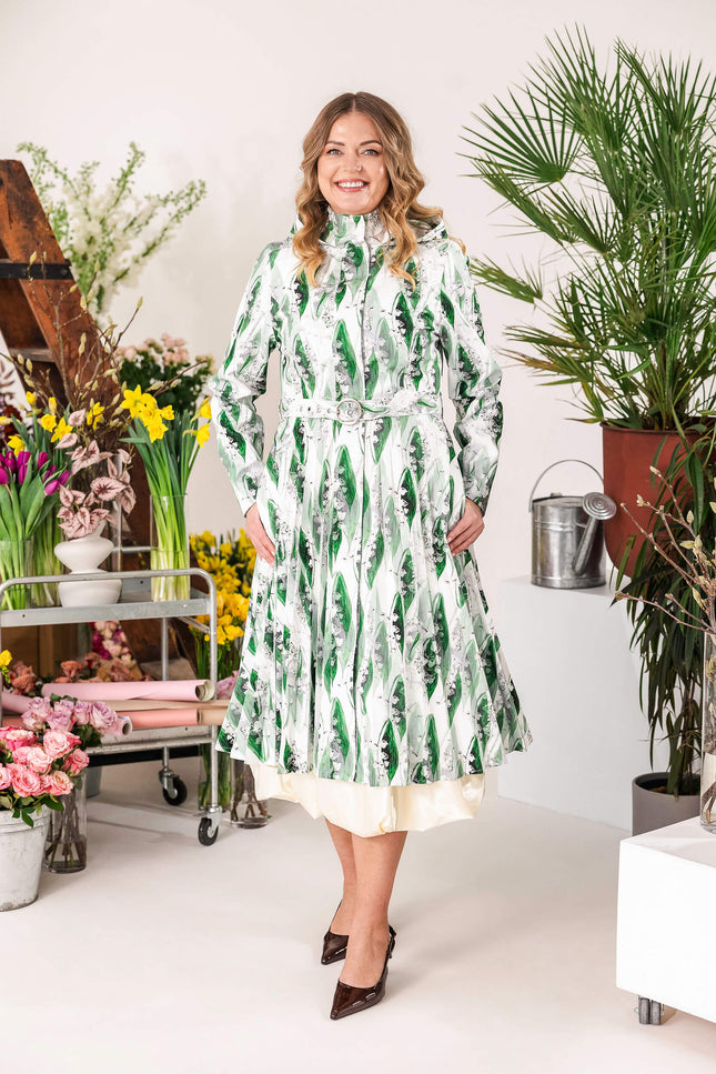Green floral A-line coat with pleated skirt