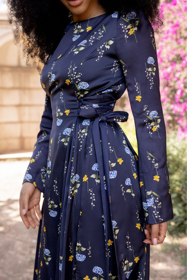 Front view of the Meadow Dream viscose rayon midi dress with adjustable waist and flowing long sleeves