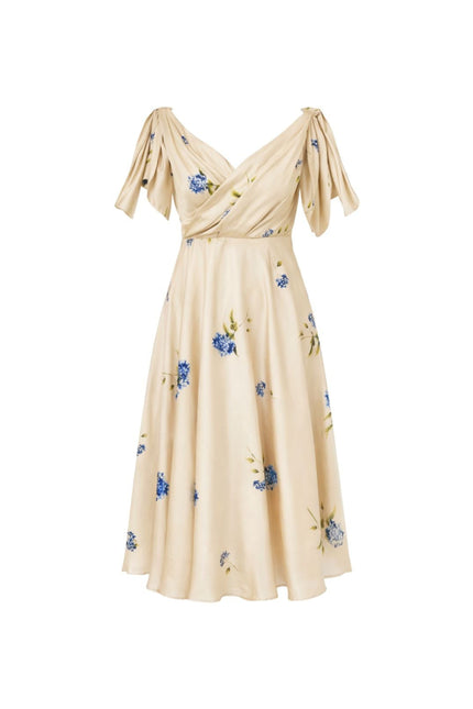 A cream-colored midi dress with a blue and green floral print, featuring short pleated sleeves and a V-neckline, shown against a plain white background.