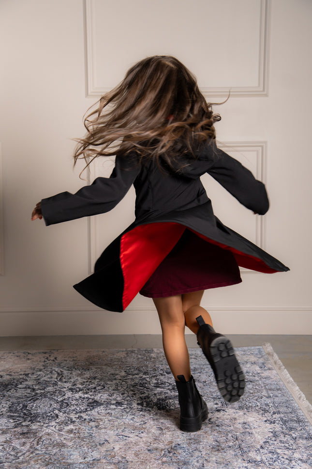 black girls coat in movement