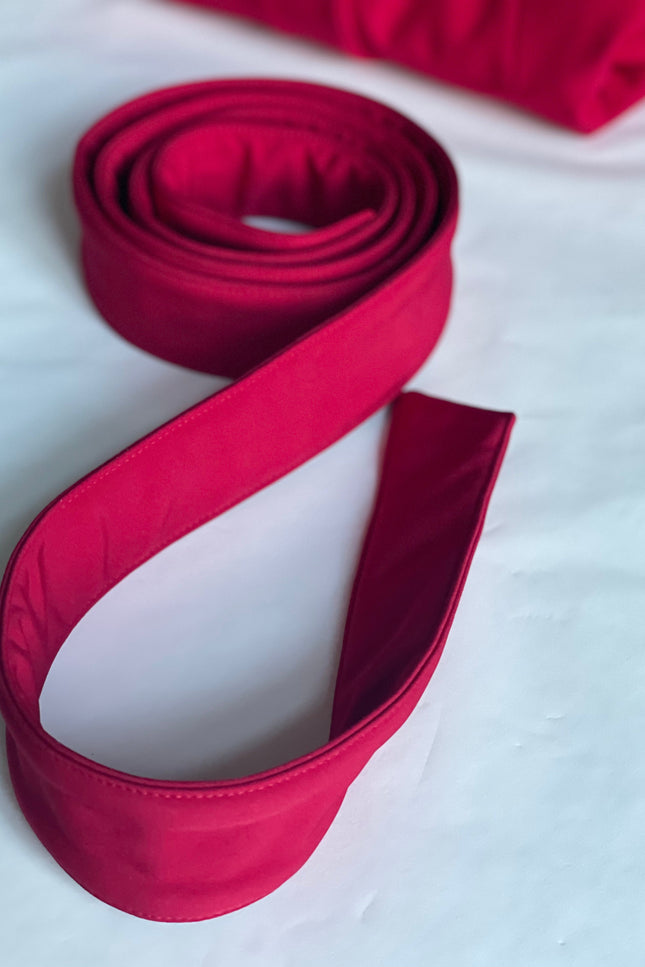 Solid red matching belt