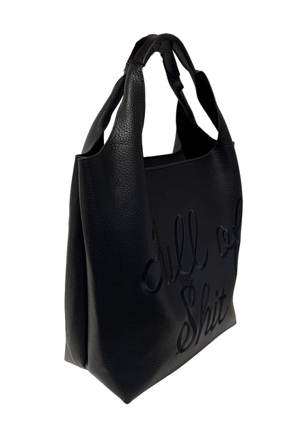 Lilly Loves black shoulder handbag with subtle "Full of Shit" print, featuring a sleek design and shoulder strap, side view image.