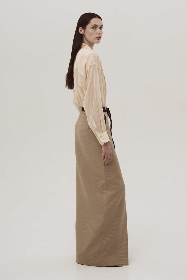 Viscose oversized biege shirt with pocket.