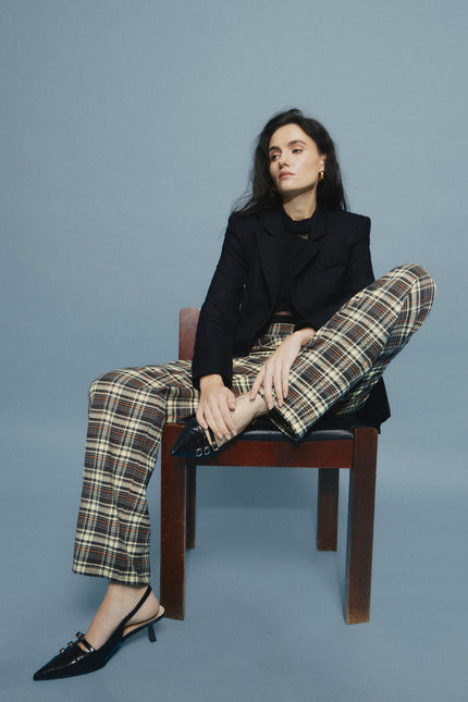 The woolen & cotton tartan trousers with zippers. Made of deadstock luxury fabrics