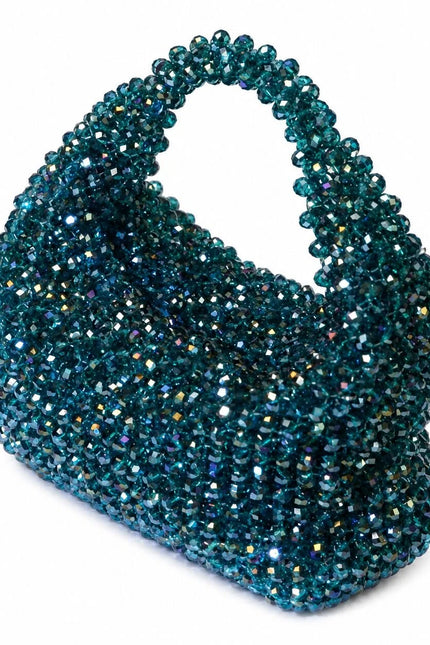 Atelier Emine Velora Azurea handcrafted crystal evening bag from the Crystal Gelato Couture series, featuring an integrated crystal stone handle and zipper closure.