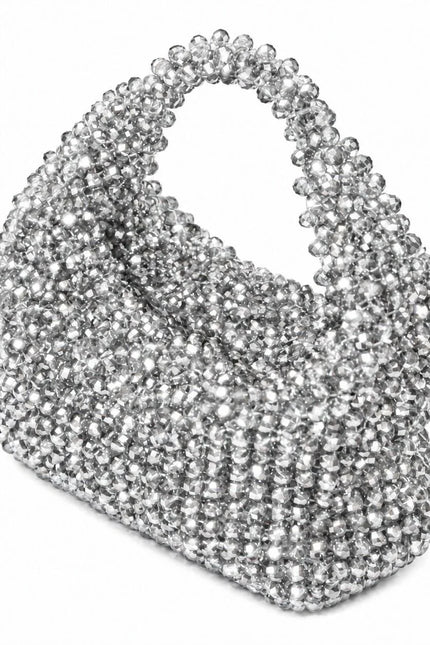 Atelier Emine Velora Griselle handcrafted crystal evening bag from the Crystal Gelato Couture series, featuring an integrated crystal stone handle and zipper closure.