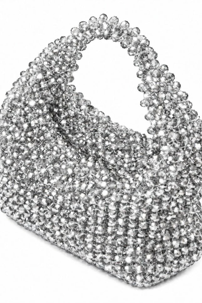Atelier Emine Velora Griselle handcrafted crystal evening bag from the Crystal Gelato Couture series, featuring an integrated crystal stone handle and zipper closure.