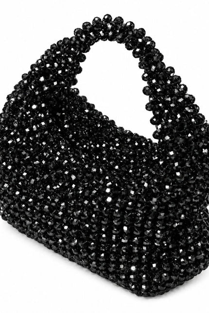 Atelier Emine Velora Abysse handcrafted crystal evening bag from the Crystal Gelato Couture series, featuring an integrated crystal handle and zipper closure.