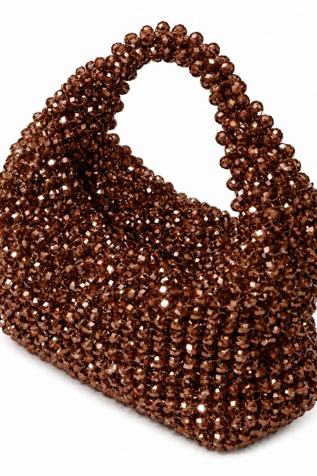 Atelier Emine Velora Browna handcrafted crystal evening bag from the Crystal Gelato Couture series, featuring an integrated crystal handle and zipper closure.