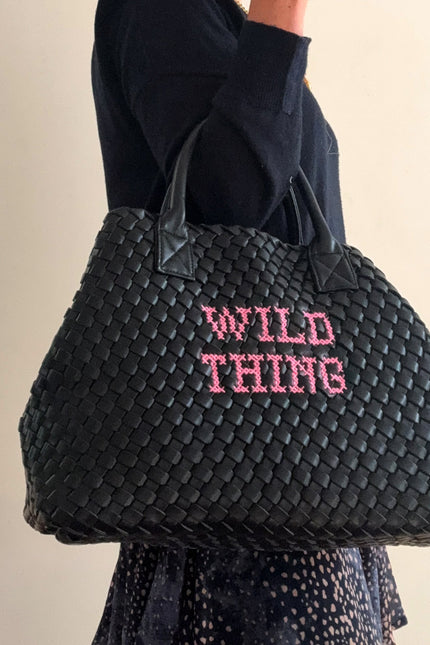 Wild Thing vegan woven handbag by Lilly Loves, featuring a handcrafted design with colorful woven patterns and a top handle.